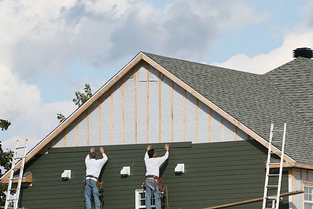 Professional Siding Contractor technician working in Jordan, NY